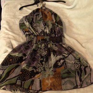 New, without tags, colorful print, small dress with beading on top.